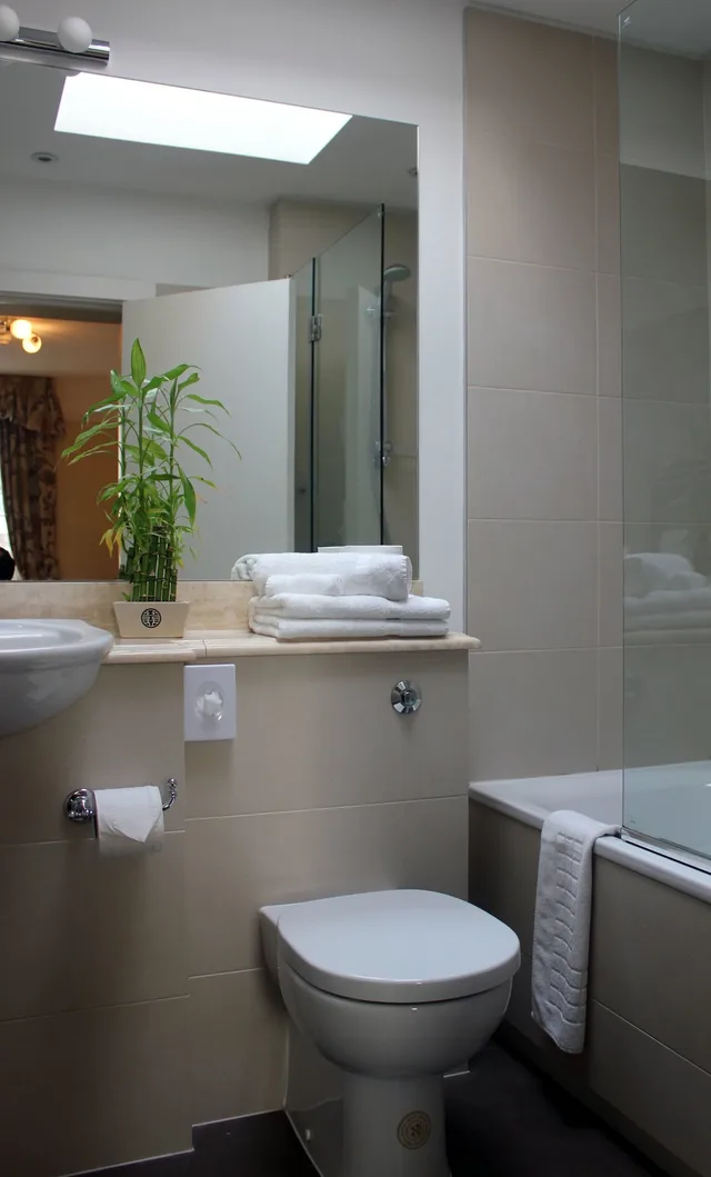 غرفة ديلوكس بسريرين منفصلين وسرير كينج، The Windermere Hotel 7/10