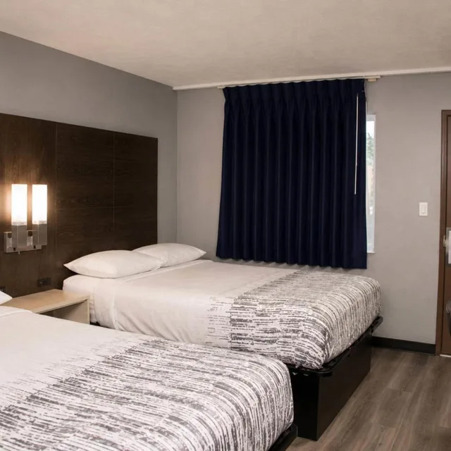 Room, Quadruple, 2 Queen Beds, Exterior Entrance، Masters Inn Augusta 1/10