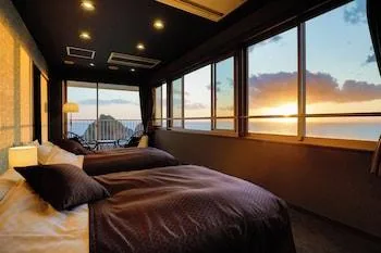 غرفة تنفيذية رباعية بسريرين منفصلين بإطلالة على البحر، DOGASHIMA HOTEL TENYU 1/1