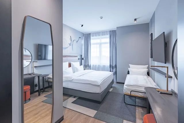 غرفة بزنس ثلاثية بسرير كينج وسرير فردي، TITANIC Comfort Kurfurstendamm 3/4