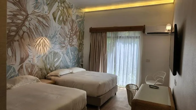 غرفة، Hotel Cocoplum Beach 1/4