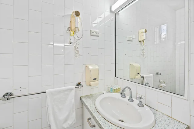 غرفة بسرير كوين وسرير فردي، Annerley Motor Inn 6/10