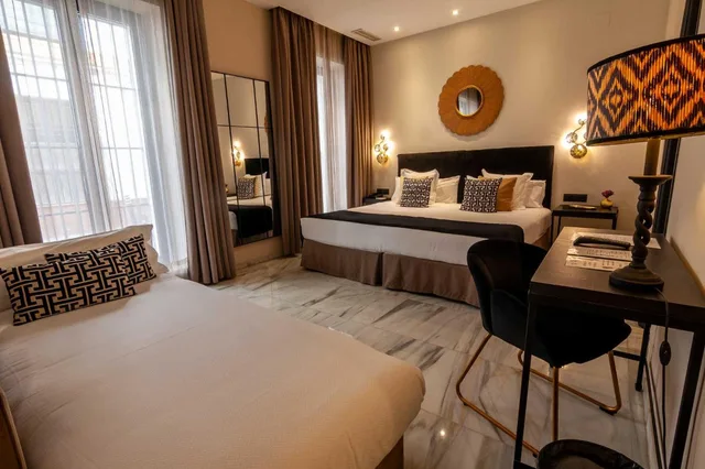 غرفة عائلية بسريرين منفصلين مع أريكة، San Gil Hotel 2/2