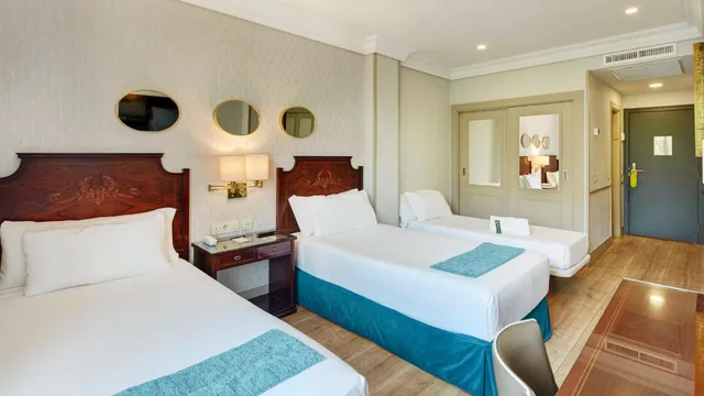 غرفة بسرير مزدوج مع سرير إضافي، Sercotel Gran Hotel Conde Duque 3/10