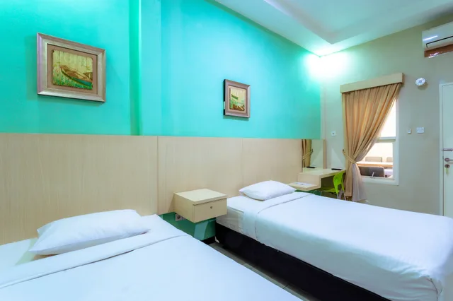 غرفة قياسية بسريرين منفصلين، Ardhya Guest House 4/9