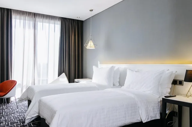غرفة قياسية بسريرين منفصلين، Trademark Hotel 1/4