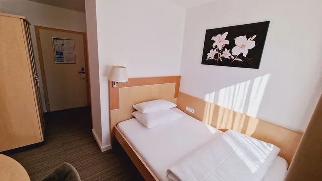غرفة مفردة بسرير فردي، Hotel Garni Metzingen 1/4