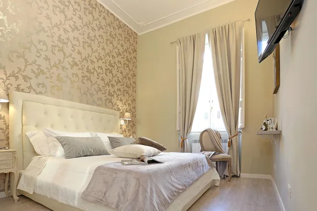 غرفة ديلوكس بسرير مزدوج، Liberty Rome Suites 2/8