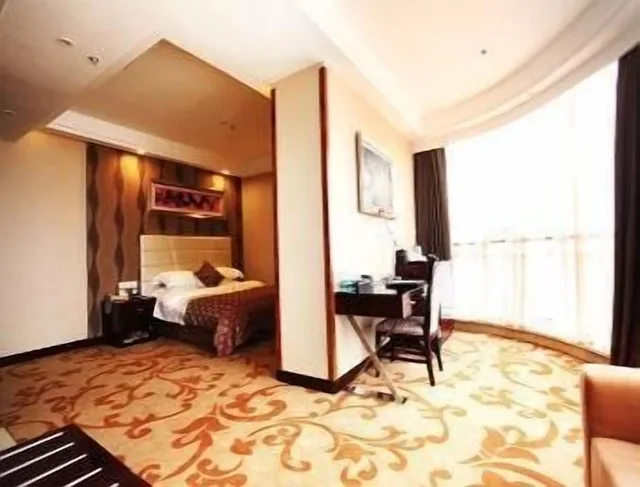 غرفة بزنس بسرير كينج، Ramada by Wyndham Linyi North 3/3