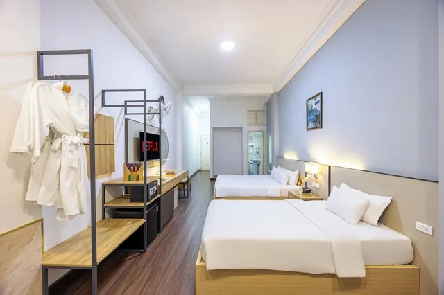 غرفة ديلوكس عائلية بسرير كوين وسرير فردي، A25 Hotel - 35 Mac Thi Buoi 3/10