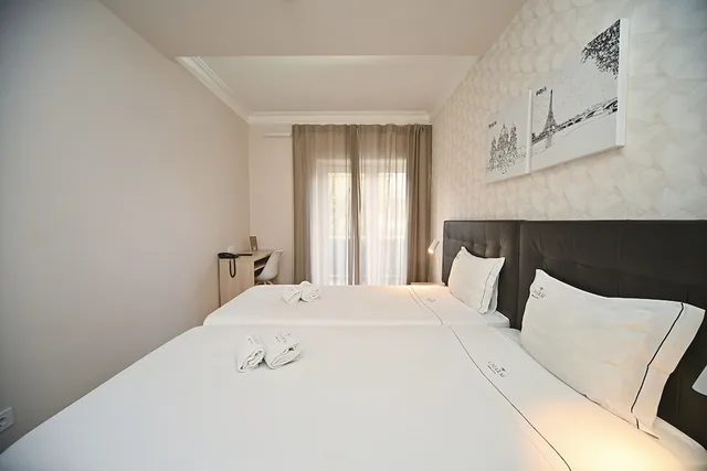 غرفة بسريرين منفصلين بحمام مشترك، My Charm Lisbon Suites 3/10