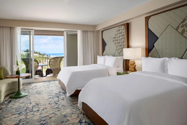 غرفة متصلة بسرير كينج بإطلالة على البحر بشرفة بإطلالة جزئية على البحر، The St. Regis Bermuda Resort 1/2