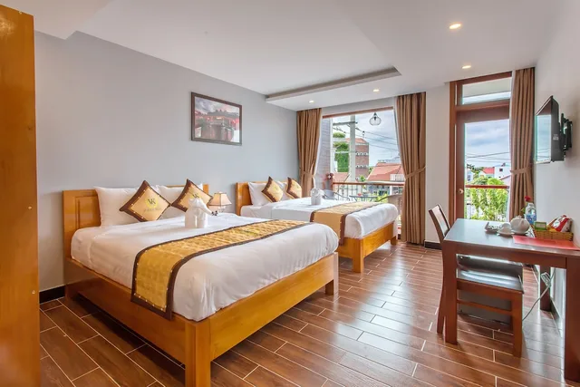 غرفة عائلية بسريرين كوين بإطلالة على المدينة بشرفة، Hoi An Vi Khoa Villa 2/7