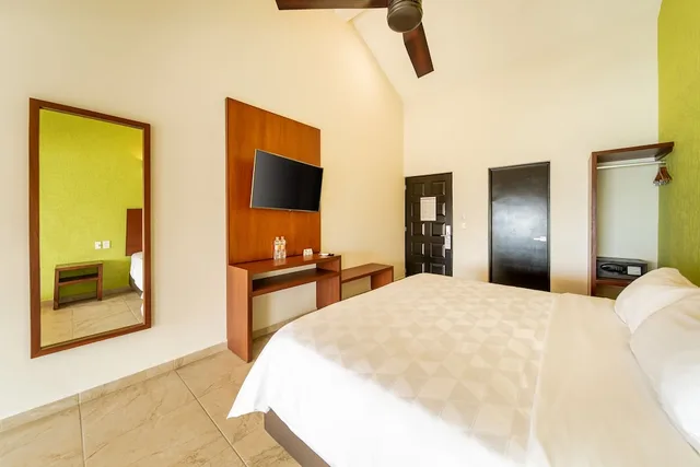 جناح جونيور بسرير كينج، Villas Coral Huatulco 1/2