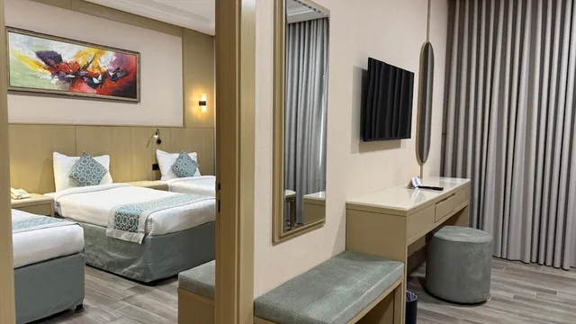 Connecting, 1 Double and 3 Single Beds، فندق عفراء(Afraa Hotel) 7/10