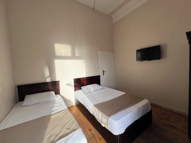 غرفة بسريرين منفصلين بحمام مشترك، Traveler Apos S House Hotel 5/10