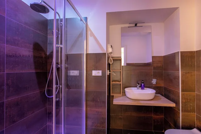 غرفة ديلوكس ثلاثية بسرير مزدوج وسرير فردي، Hotel Ciao 5/6