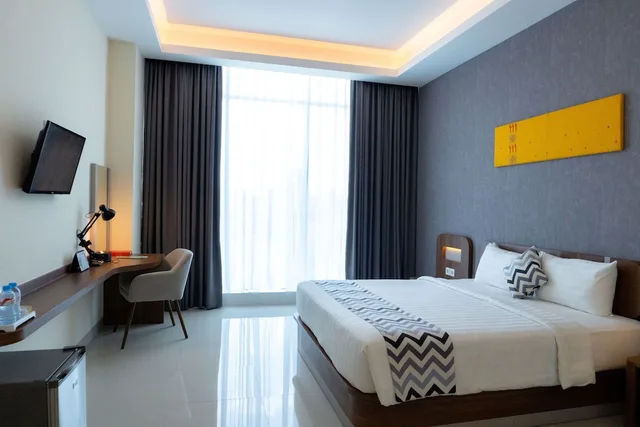 غرفة ديلوكس بسرير كينج، Unhas Hotel and Convention 1/3