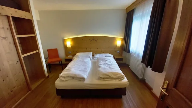 غرفة عائلية بسرير كوين وسرير فردي، Hotel Monte Bondone 1/10