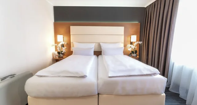 غرفة كومفورت مفردة بسريرين منفصلين، PLAZA INN Heilbronn 5/10