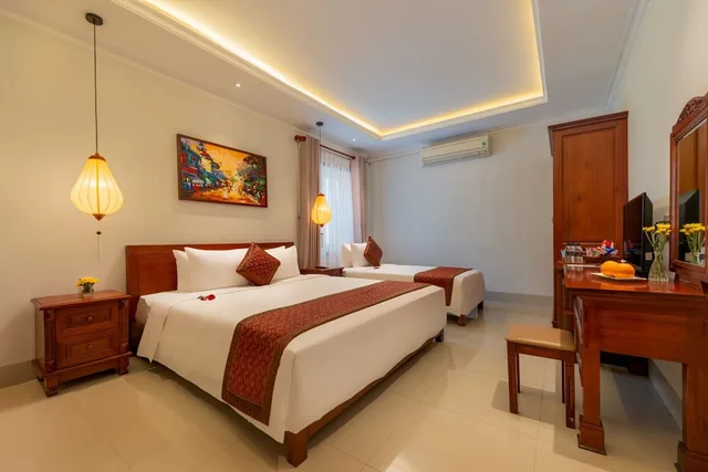 غرفة ديلوكس ثلاثية بسرير كوين وسرير فردي، Iris Villa Hoi an 2/4