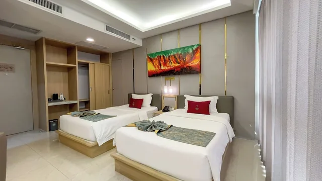 غرفة عائلية رباعية بسرير كوين وسريرين منفصلين، Elegant Bangkok Hotel 6/10