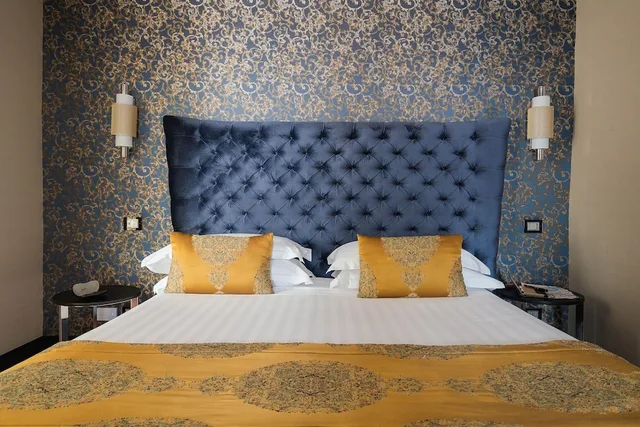 شقة ديلوكس بسرير كينج مع أريكة، Unica Suite Rome 1/3