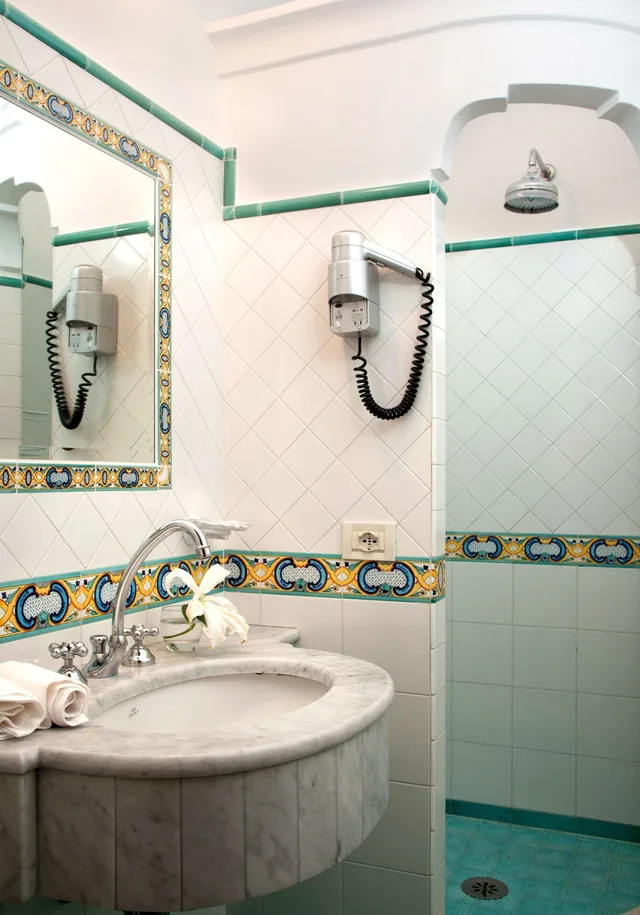غرفة ثلاثية بإطلالة، Hotel Reginella Positano 1/1