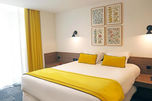 غرفة رباعية، TIMHOTEL LE LOUVRE 2/5