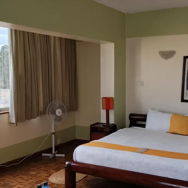 غرفة عائلية، The Kenya Comfort Hotel Suites 2/6
