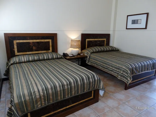 غرفة ديلوكس بسرير كوين، Citystate Asturias Hotel Palawan 8/10