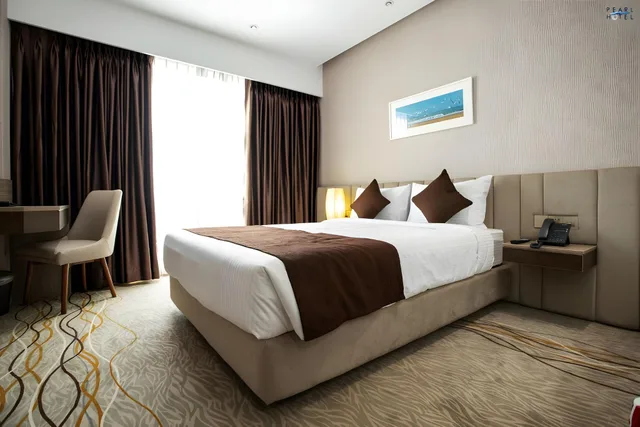 غرفة بريميوم بسرير كوين، Pearl Hotel 1/1