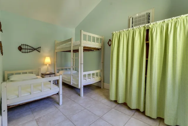 دوبلكس ديلوكس بسرير مزدوج وسريرين منفصلين وسرير بطابقين بشرفة بغرفتي نوم، Pousada Vila do Bosque 4/5