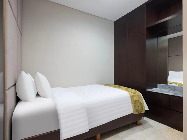 جناح عائلي بسرير كينج وسرير فردي بإطلالة على المسبح، The Grove Suites by Grand Aston 1/3