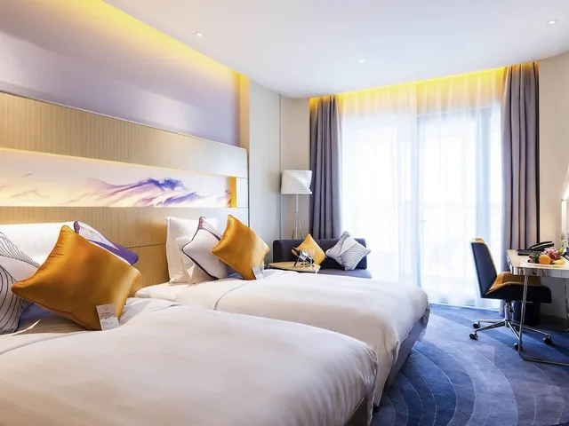غرفة ديلوكس بسريرين منفصلين، Novotel Suzhou Sip 1/8