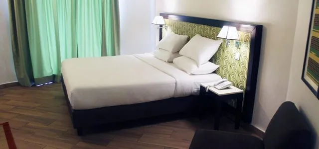 غرفة قياسية مفردة بسرير فردي، Grand Hotel d'Abidjan 1/2
