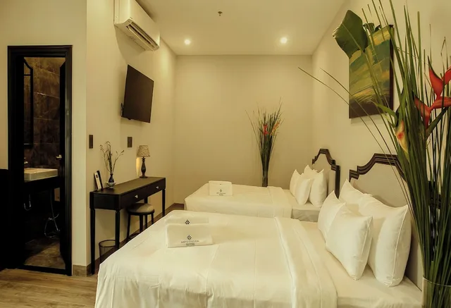 جناح عائلي بسريرين كوين بإطلالة على المدينة، Anvi Saigon Boutique Hotel 1/8