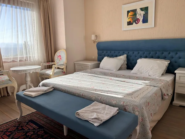 غرفة عائلية رباعية بسرير كينج وسريرين منفصلين، Aeneas Hotel 7/8