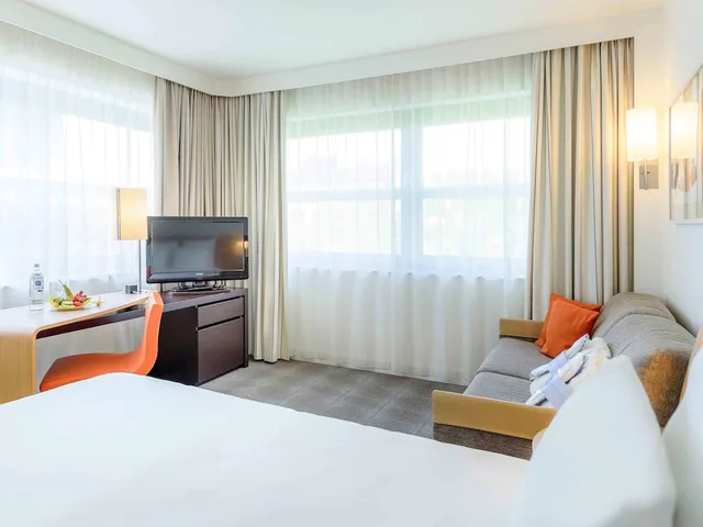 غرفة تنفيذية بسرير مزدوج مع أريكة، Novotel Aachen City Hotel 9/10