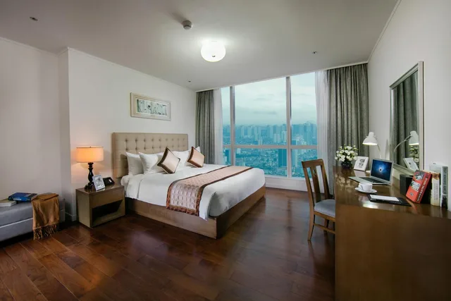 غرفة ديلوكس بسرير كينج وسرير كوين بغرفتي نوم، CALIDAS Landmark72 Royal Residence HANOI A 2/3