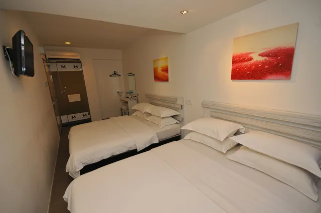 غرفة ديلوكس عائلية بسريرين كوين، M Design Hotel 1/3