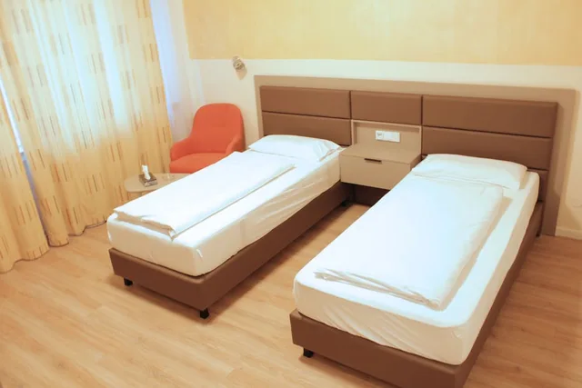 غرفة اقتصادية بسريرين منفصلين، Isar City Hotel 1/8