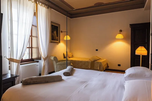 غرفة كلاسيكية ثلاثية بسرير مزدوج وسرير فردي، Hotel Tenimento Al Castello 1/7