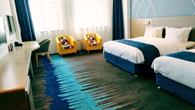 غرفة قياسية بسرير كينج وسرير فردي، HOLIDAY INN EXPRESS WEIHAI ECONOMIC ZONE 2/4