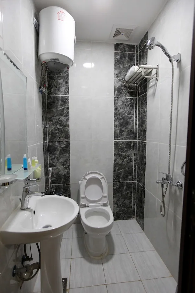 شقة بسرير مزدوج وسريرين منفصلين بغرفتي نوم، فندق برج العنوان(Enwan Suites Serviced Apartments) 8/10