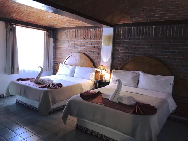 غرفة ديلوكس بسريرين مزدوجين، Suites Paraiso TX 1/3