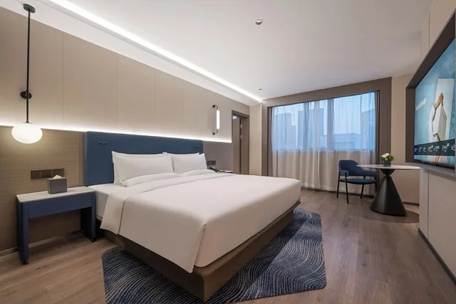 غرفة تنفيذية بسرير كينج، Novotel Wuxi Sanyang Plaza 3/6