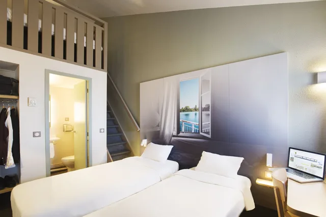 غرفة رباعية بأربعة أسرّة، B&B Hotel Lyon Saint Priest 1/4