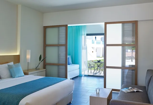 غرفة عائلية بسرير كوين وسريرين منفصلين بإطلالة على الحديقة، Tui Magic Life Plimmiri 1/2