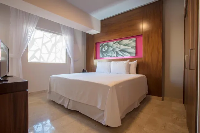 One Bedroom Suite at BelAir SunClub, Krystal Grand Los Cabos All Inclusive 1/3